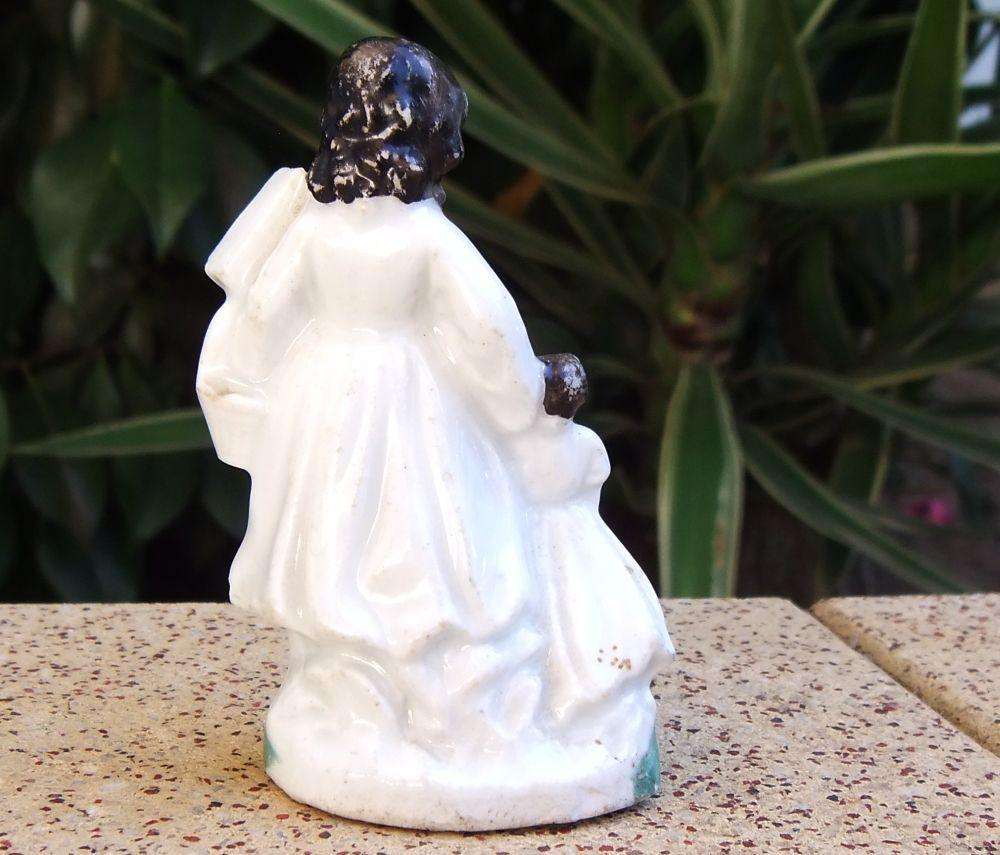 An extremely rare Victorian mother & child porcelain ornament