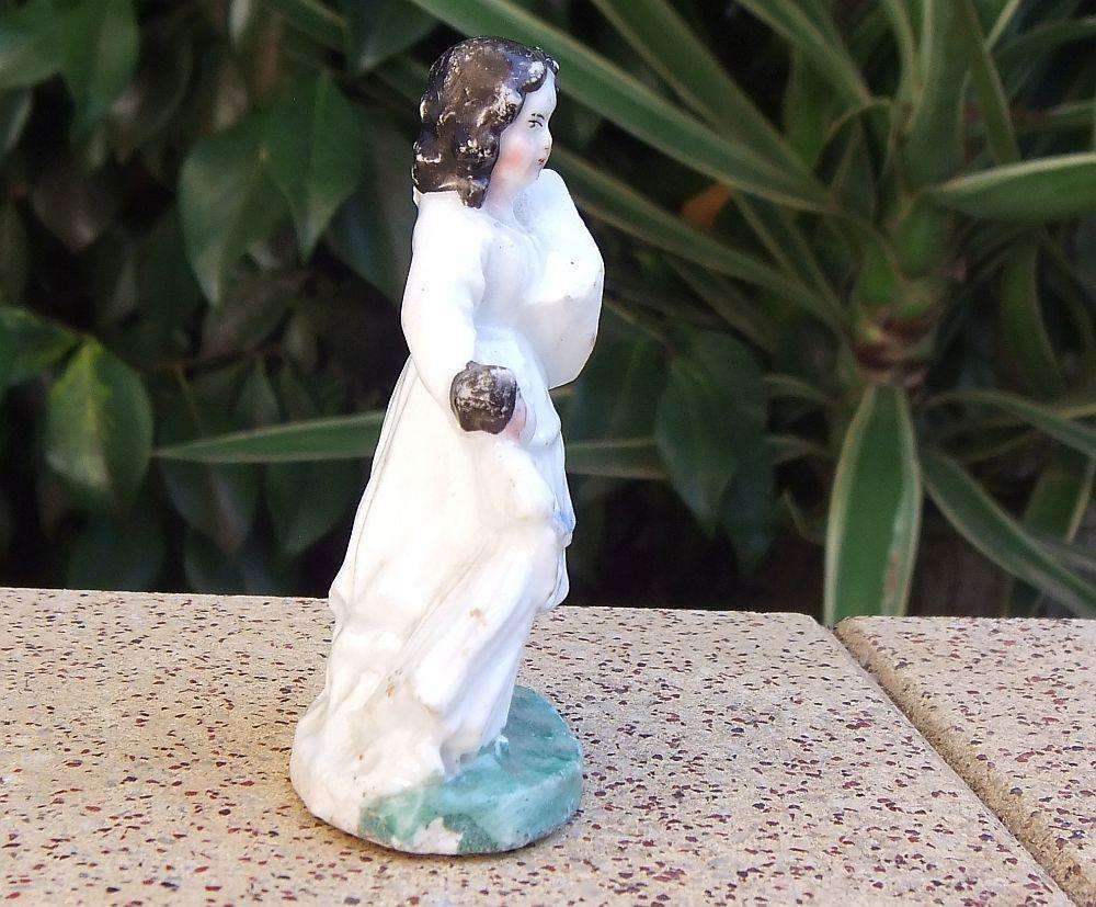 An extremely rare Victorian mother & child porcelain ornament