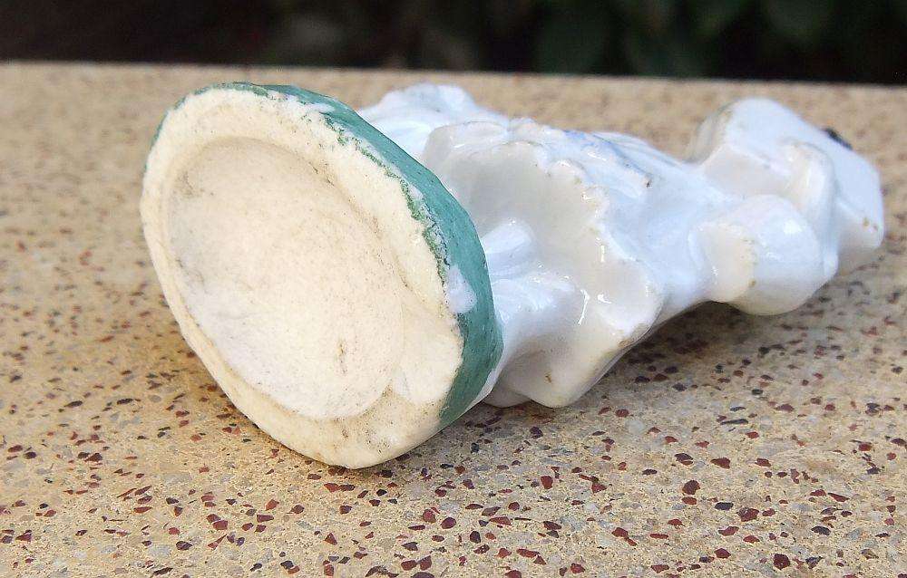 An extremely rare Victorian mother & child porcelain ornament