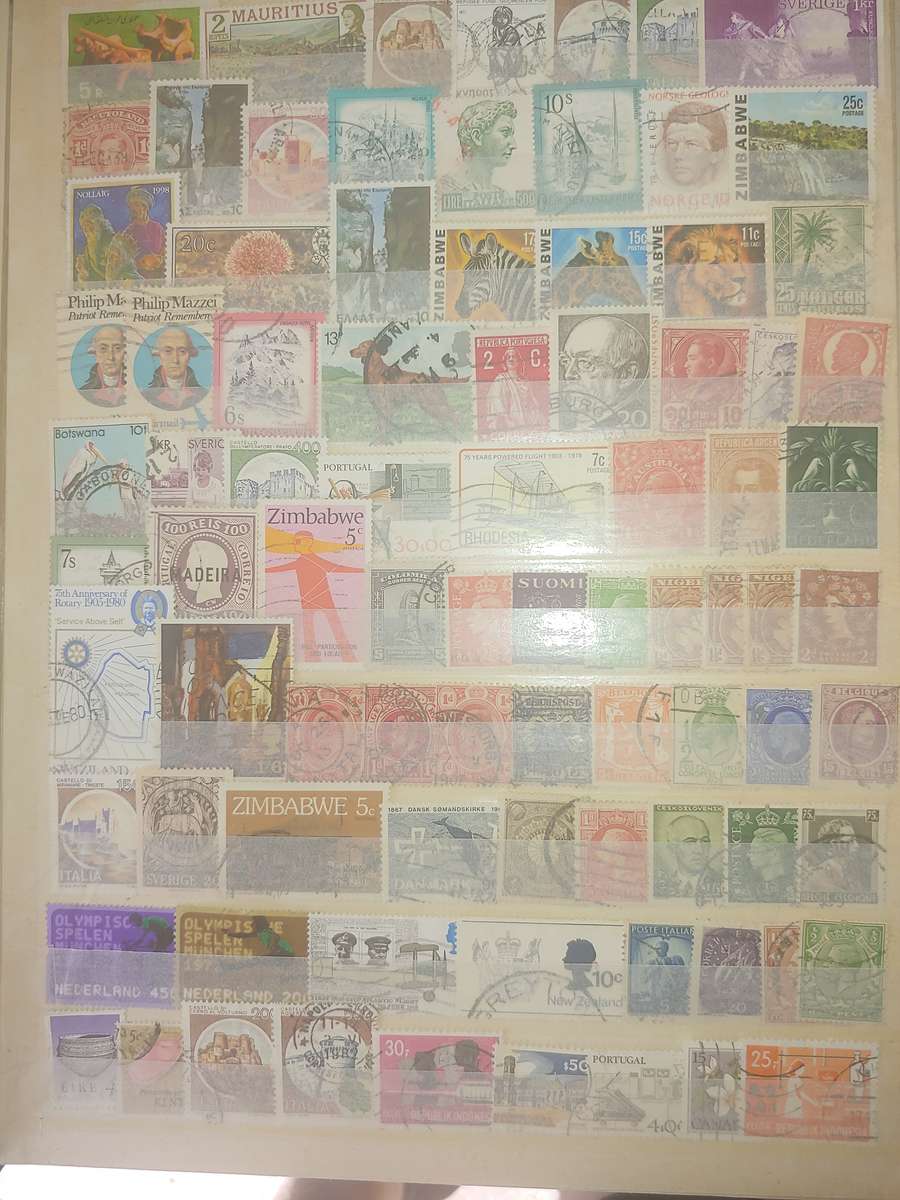 A4 USED STOCKBOOK FULLY LOADED WITH WORLD STAMPS 16/32 PAGE