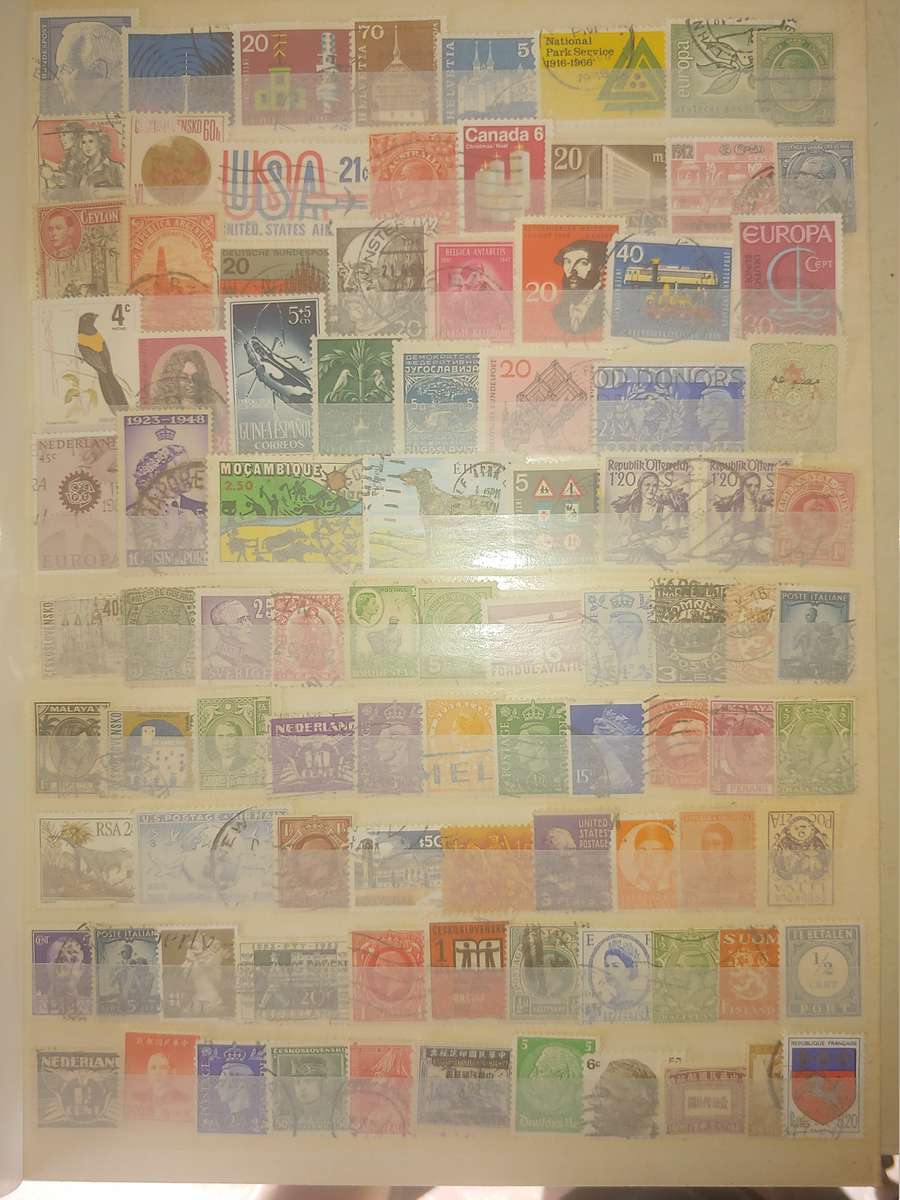 A4 USED STOCKBOOK FULLY LOADED WITH WORLD STAMPS 16/32 PAGE