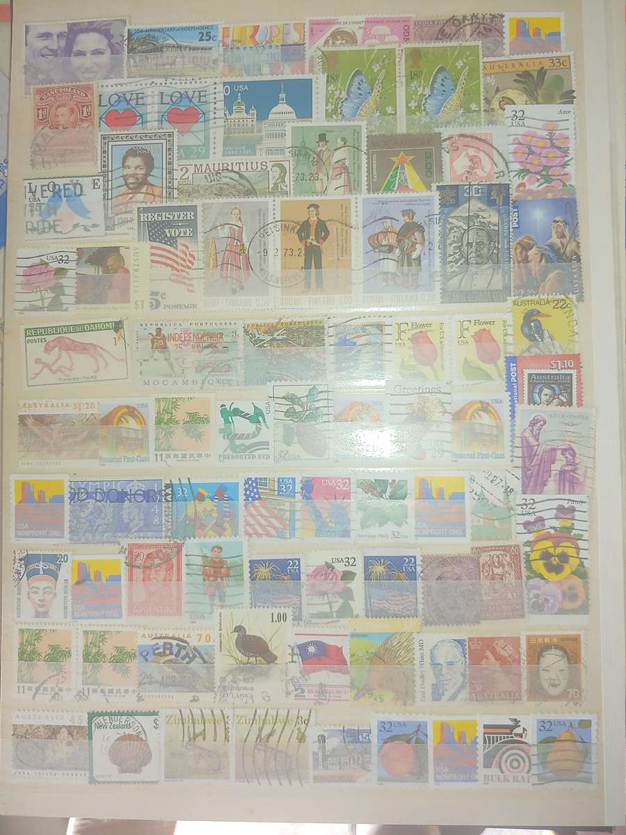 A4 USED STOCKBOOK FULLY LOADED WITH WORLD STAMPS 16/32 PAGE