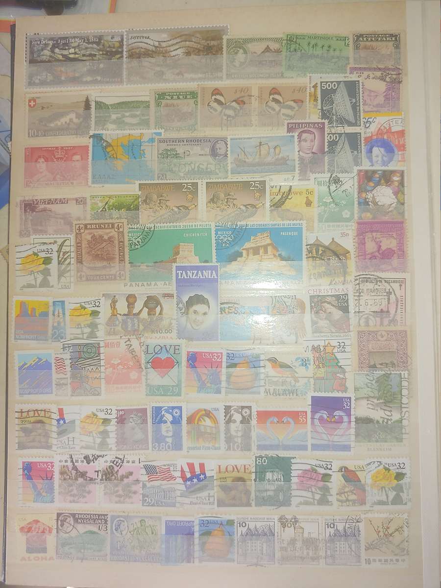 A4 USED STOCKBOOK FULLY LOADED WITH WORLD STAMPS 16/32 PAGE