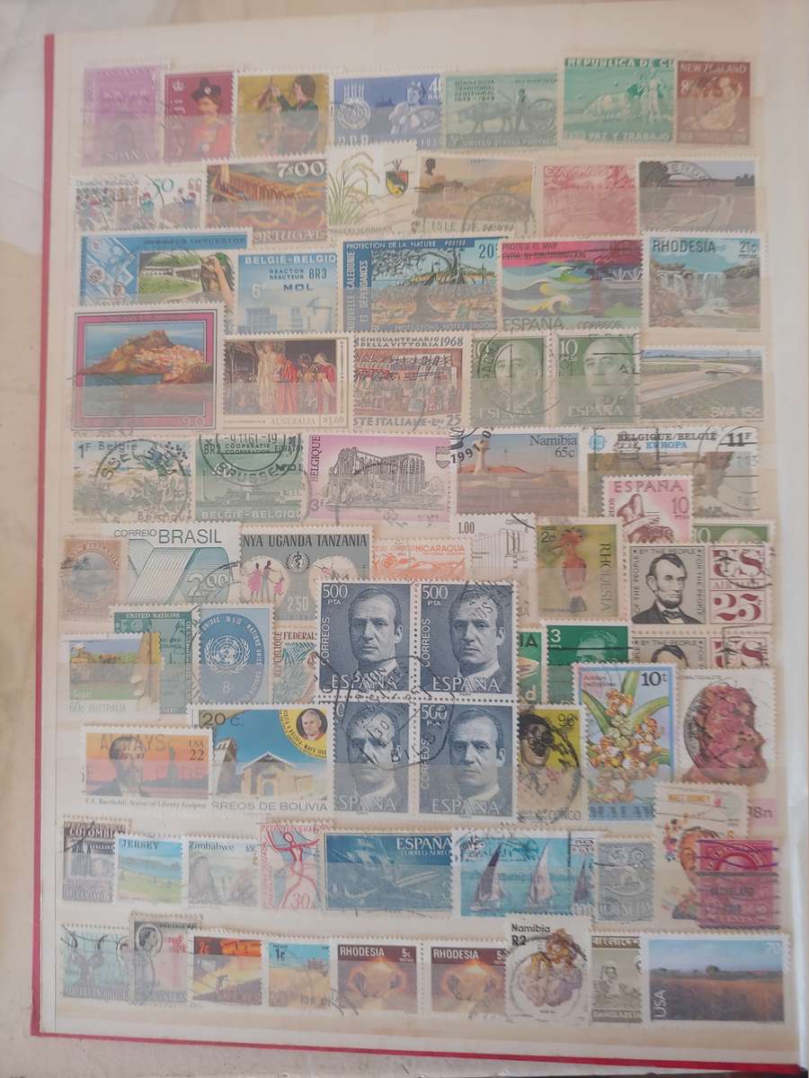 A4 USED LIGHTHOUSE ALBUM LOADED WITH MIXED WORLD STAMPS 16/32 PAGES NOT ALL SHOWN