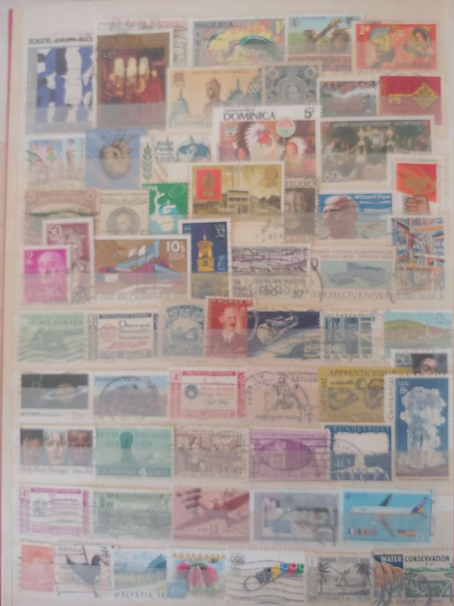 A4 USED LIGHTHOUSE ALBUM LOADED WITH MIXED WORLD STAMPS 16/32 PAGES NOT ALL SHOWN