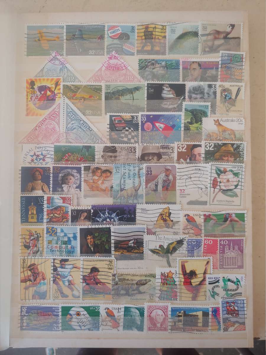 A4 USED LIGHTHOUSE ALBUM LOADED WITH MIXED WORLD STAMPS 16/32 PAGES NOT ALL SHOWN