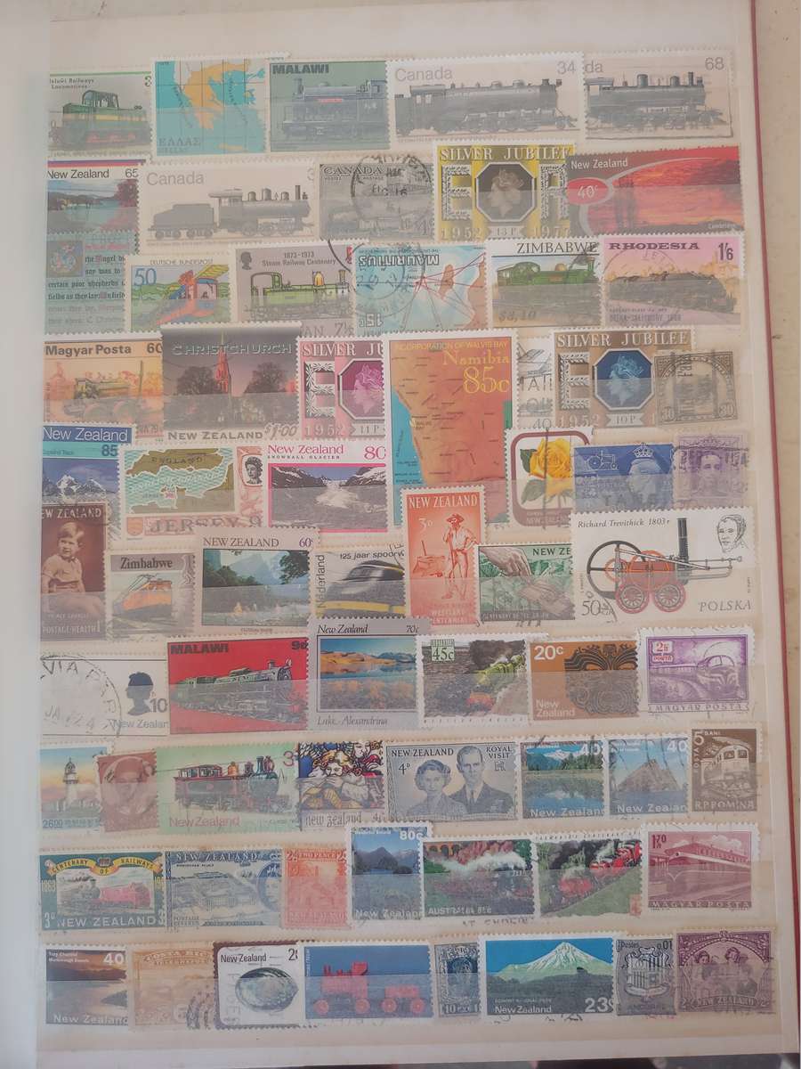 A4 USED LIGHTHOUSE ALBUM LOADED WITH MIXED WORLD STAMPS 16/32 PAGES NOT ALL SHOWN