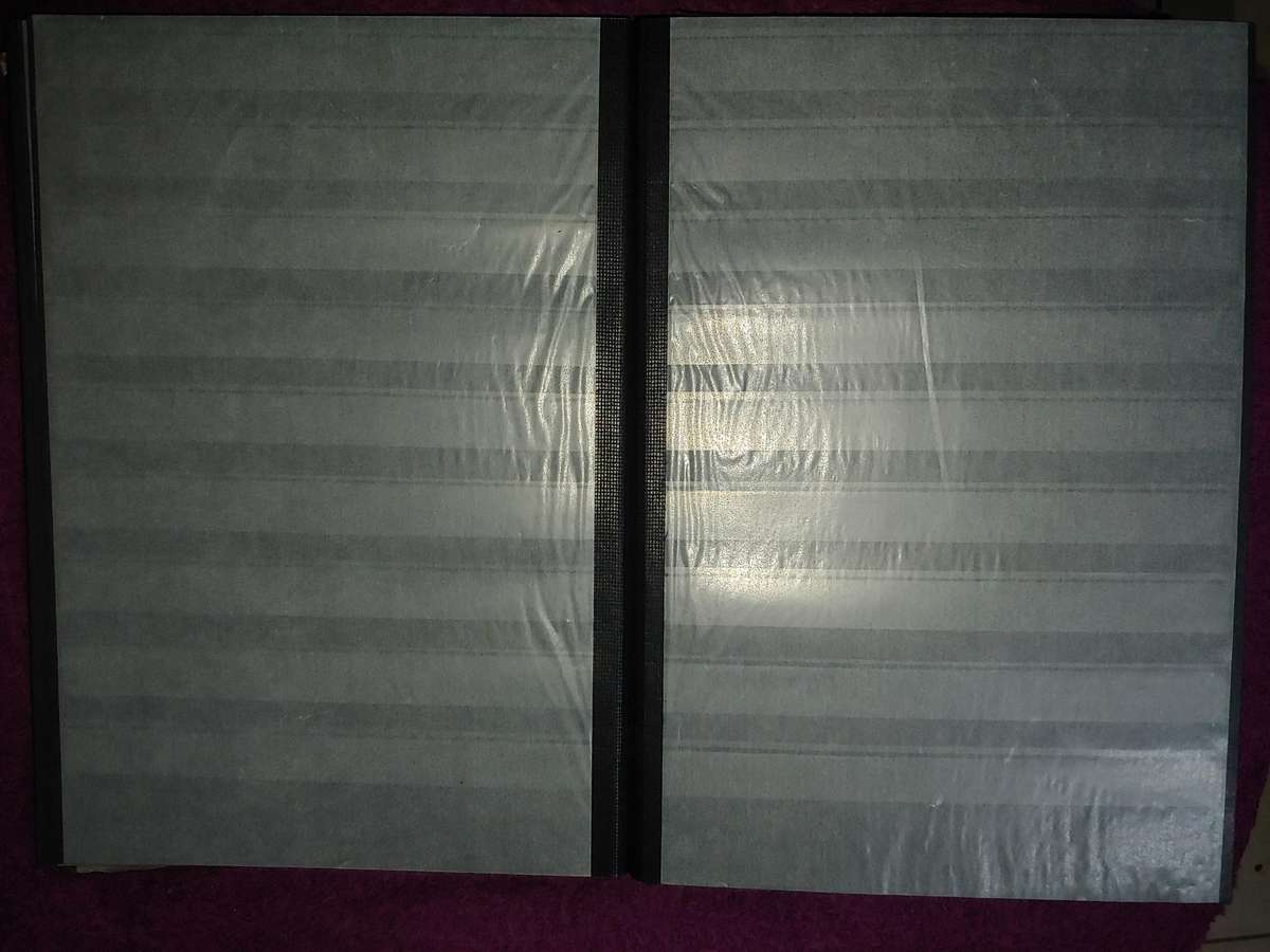 USED A4 STOCKBOOK WITH BLACK PAGES IN VERY GOOD CONDITION 24/48 PAGES