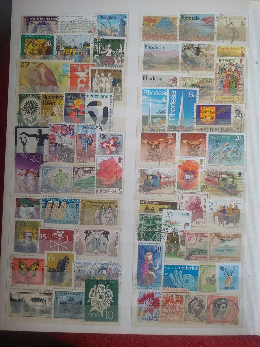 USED A4 KEK STOCKBOOK LOADED WITH MIXED WORLD STAMPS 15/30 PAGES