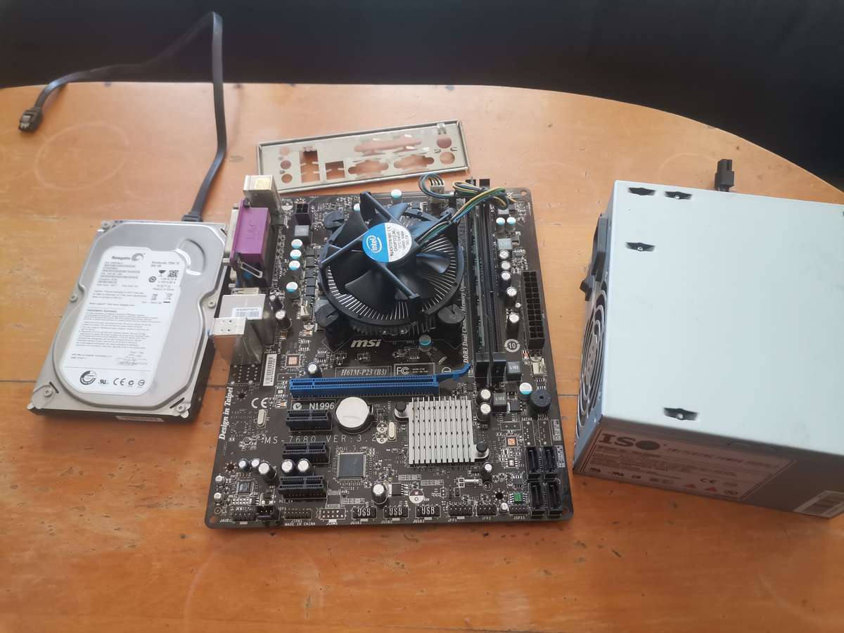 Motherboard H61M-P23+i3 2Gen cpu+4GB Ddr 3 1066 ram+500Gb Hardrive+420w Psu+only Pc case needed.