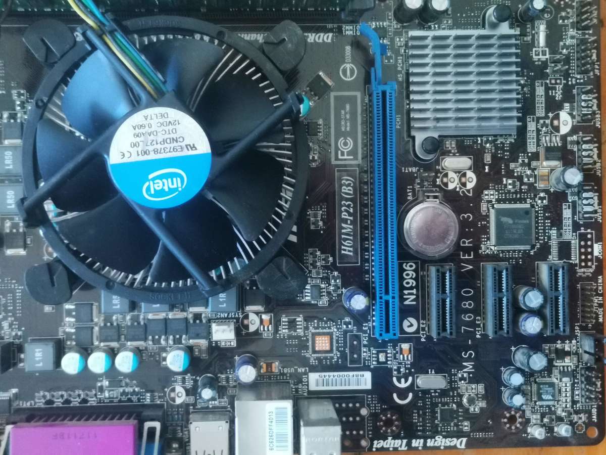 Motherboard H61M-P23+i3 2Gen cpu+4GB Ddr 3 1066 ram+500Gb Hardrive+420w Psu+only Pc case needed.