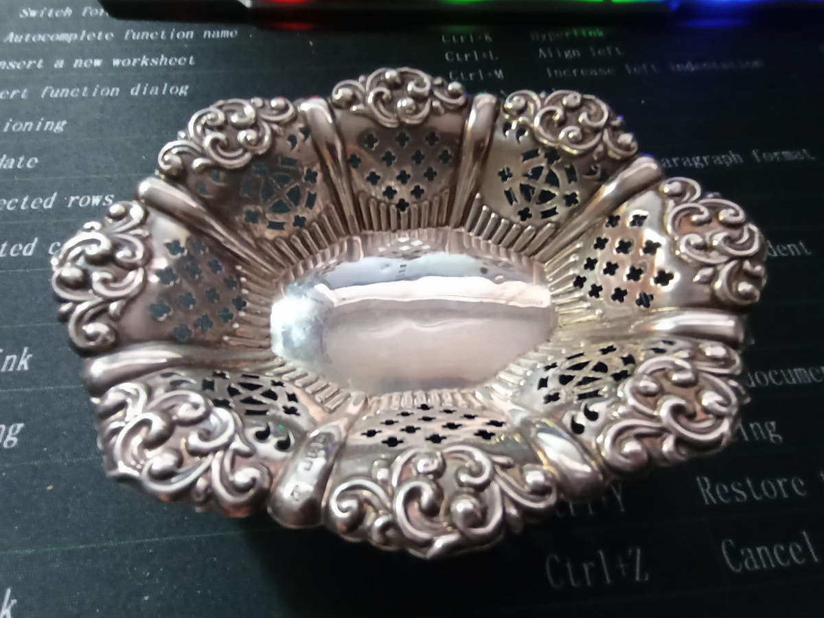 Birmingham hallmarked silver. Small.pierced Bon Bon dish weigh 37 grams .. selling as per scan