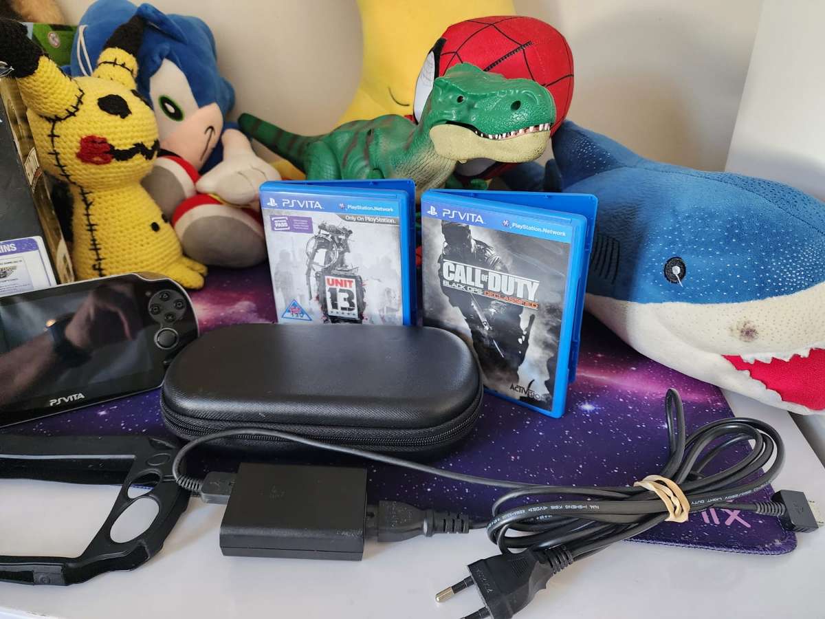 PS VITA WIFI OLED, 2 Games, Original Packaging (Pre-owned)