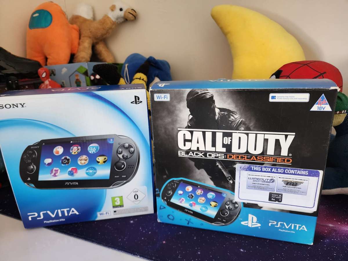 PS VITA WIFI OLED, 2 Games, Original Packaging (Pre-owned)
