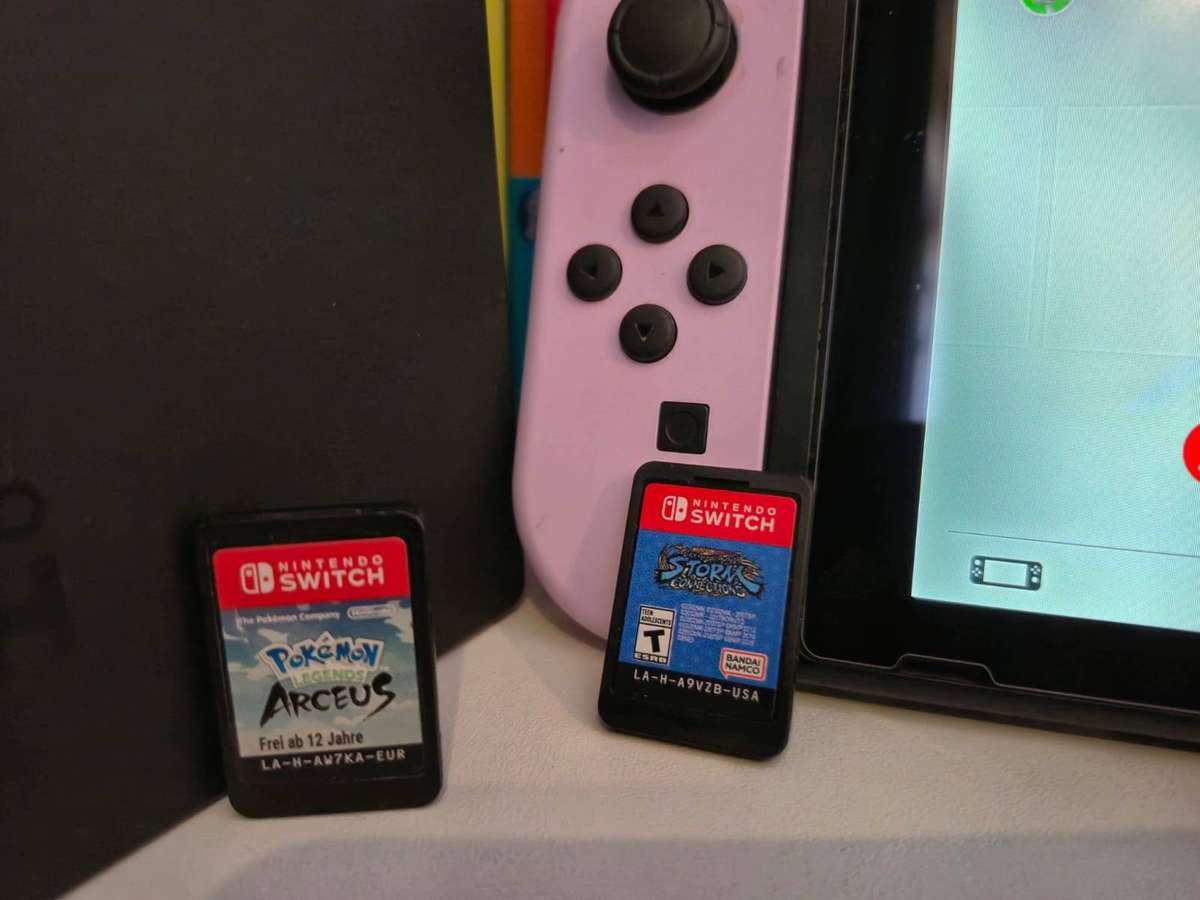 Nintendo Switch V1, Docking Station, 2 Games, Pouch (Pre-owned)