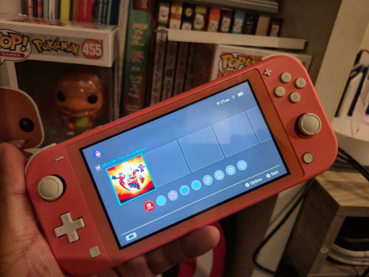 Nintendo Switch Lite 32GB Coral Pink, (1 Game) Lego : The Incredibles, (Pre-owned)