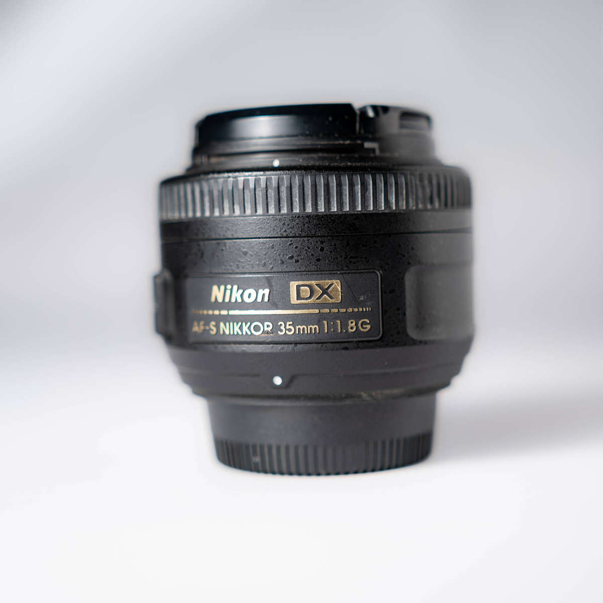 Nikon 35mm F1.8 Prime Lens with front and back covers