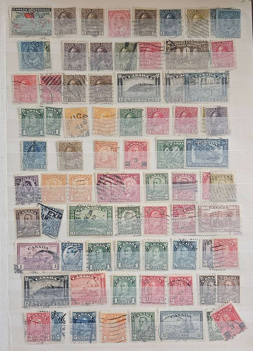 Canada mixed lot on album pages.