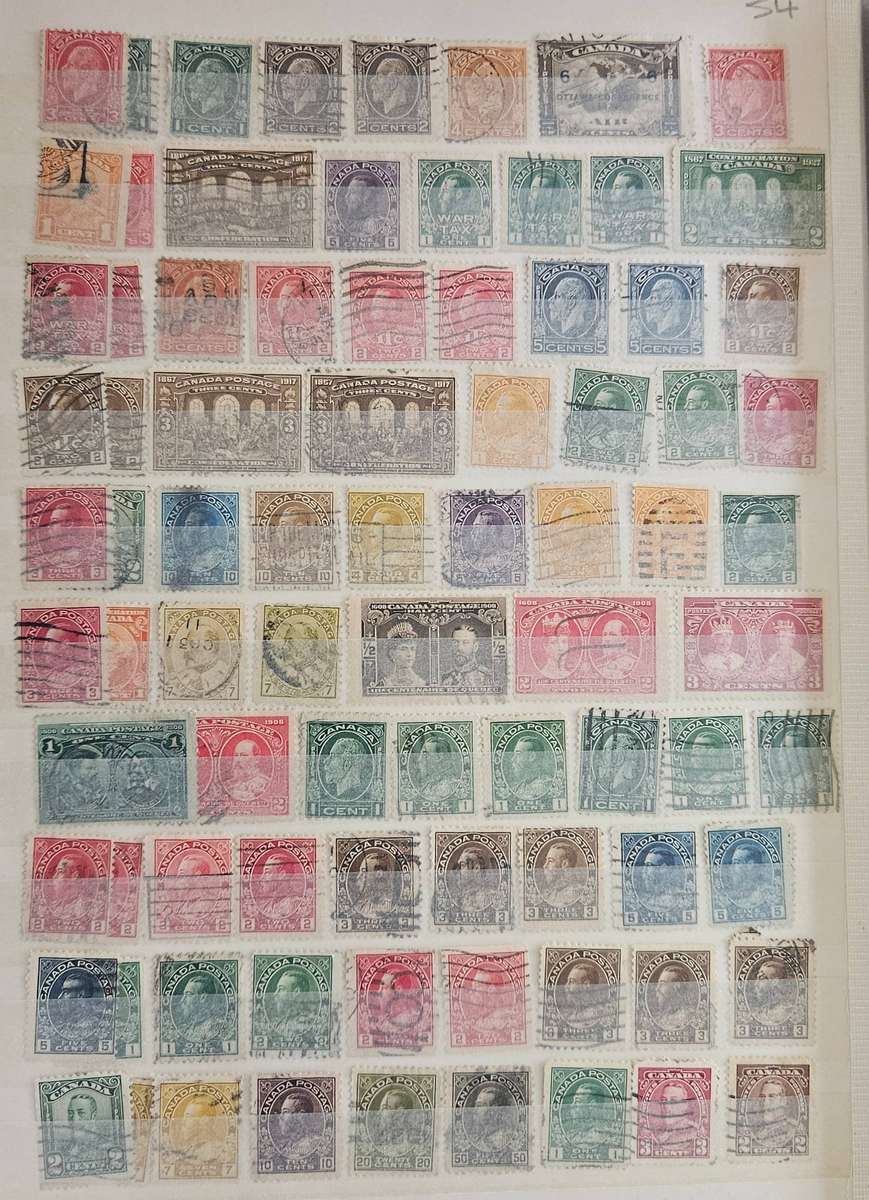 Canada mixed lot on album pages.