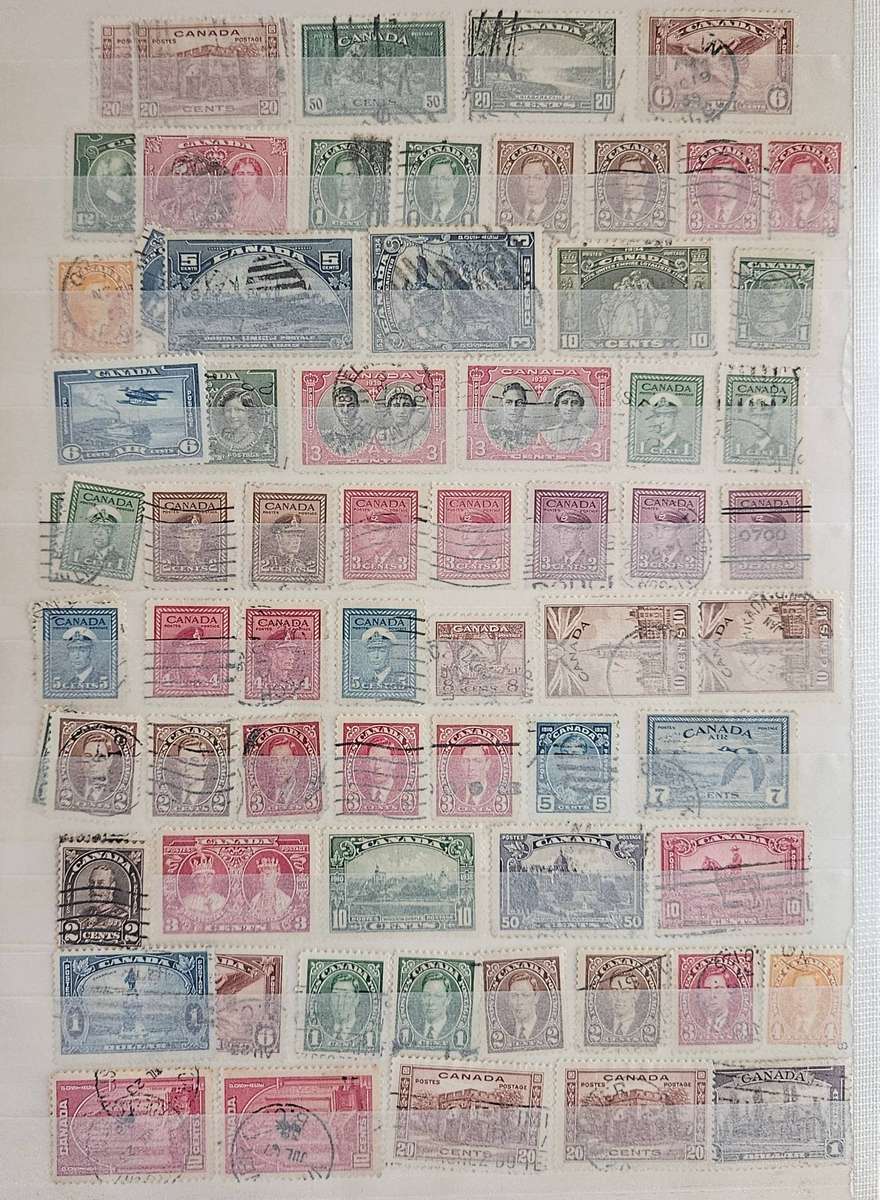 Canada mixed lot on album pages.