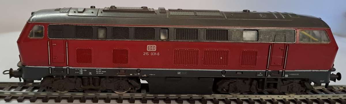 Model Trains HO 1 x Diesel locomotive class DB 215 031-6 with Lima couplers.