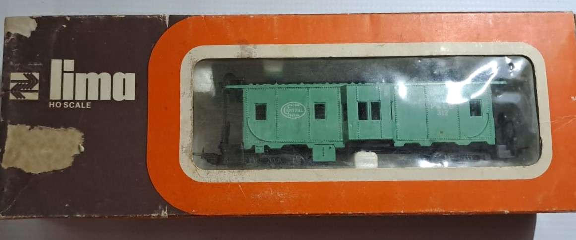 Model Trains H0 Lima New York Central System Caboose, with plastic wheels & Lima couplers. Boxed