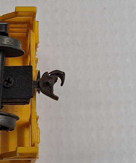 Model Trains HO 1 x Union Pacific hopper, with plastic wheels & 1x KD & 1x Horn hook coupler.