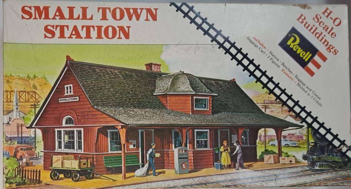 Model Trains HO 1 x Small Town Station. Was previously build. Missing one figure & trolly.