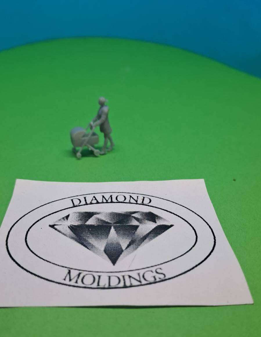Model Trains HO 1 x Figures - Woman pushing a pram. Unpainted