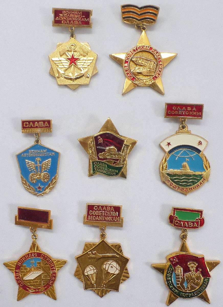 Selection of 8 different military badges from the USSR