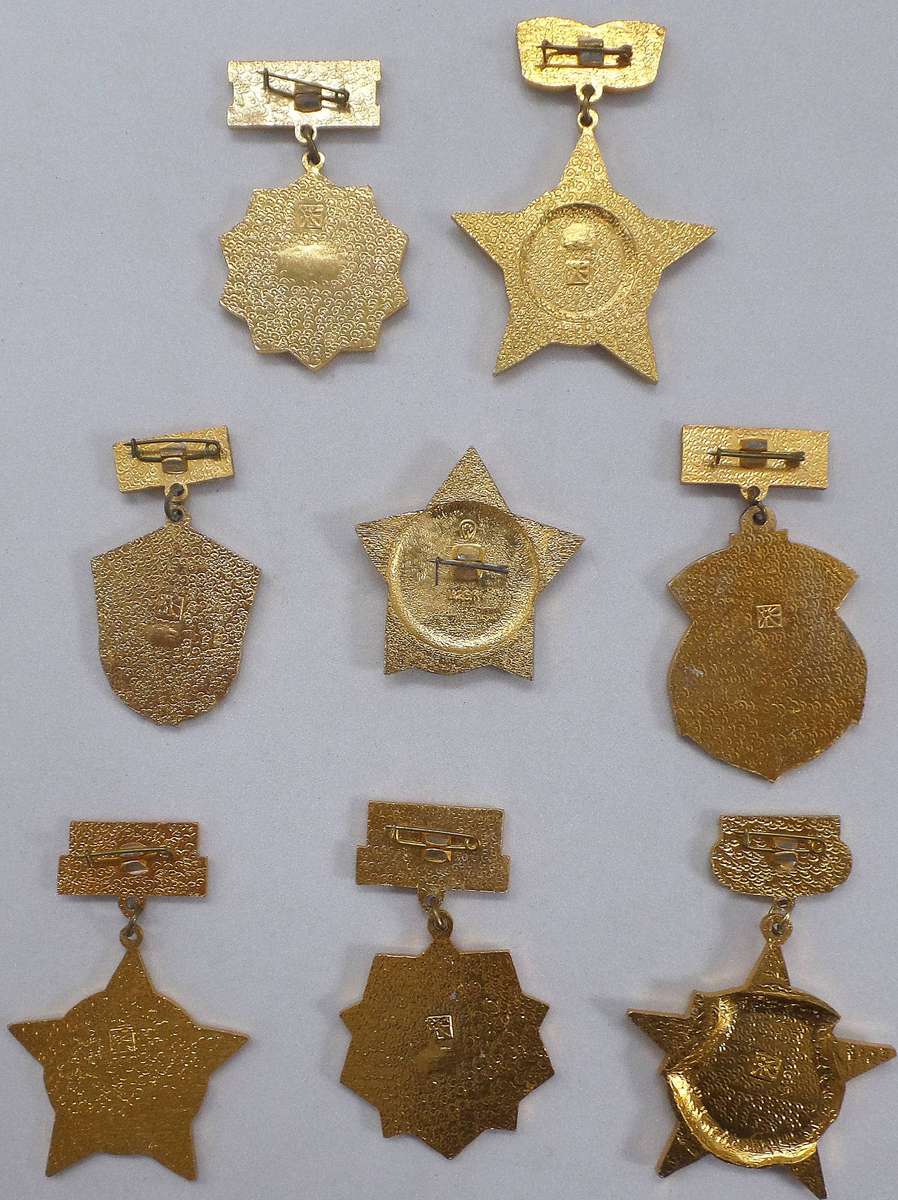 Selection of 8 different military badges from the USSR