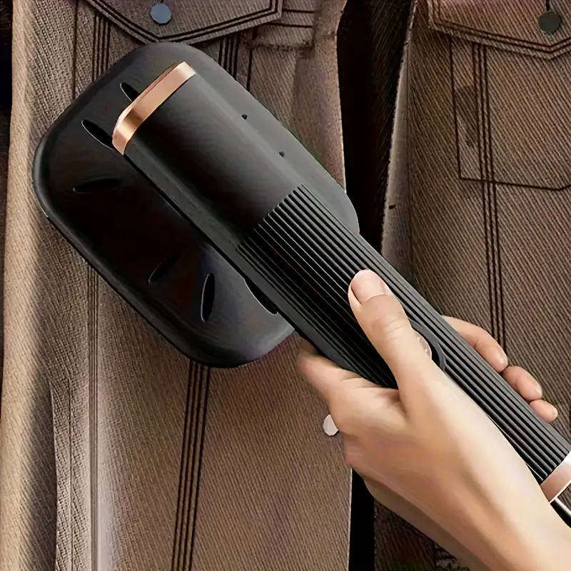 Portable handheld steamer/iron