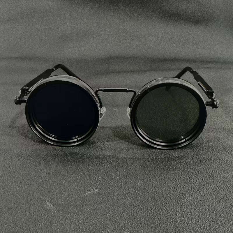 Steampunk-Inspired Rotating sun Glasses with Adjustable Lenses and Brightness Levels