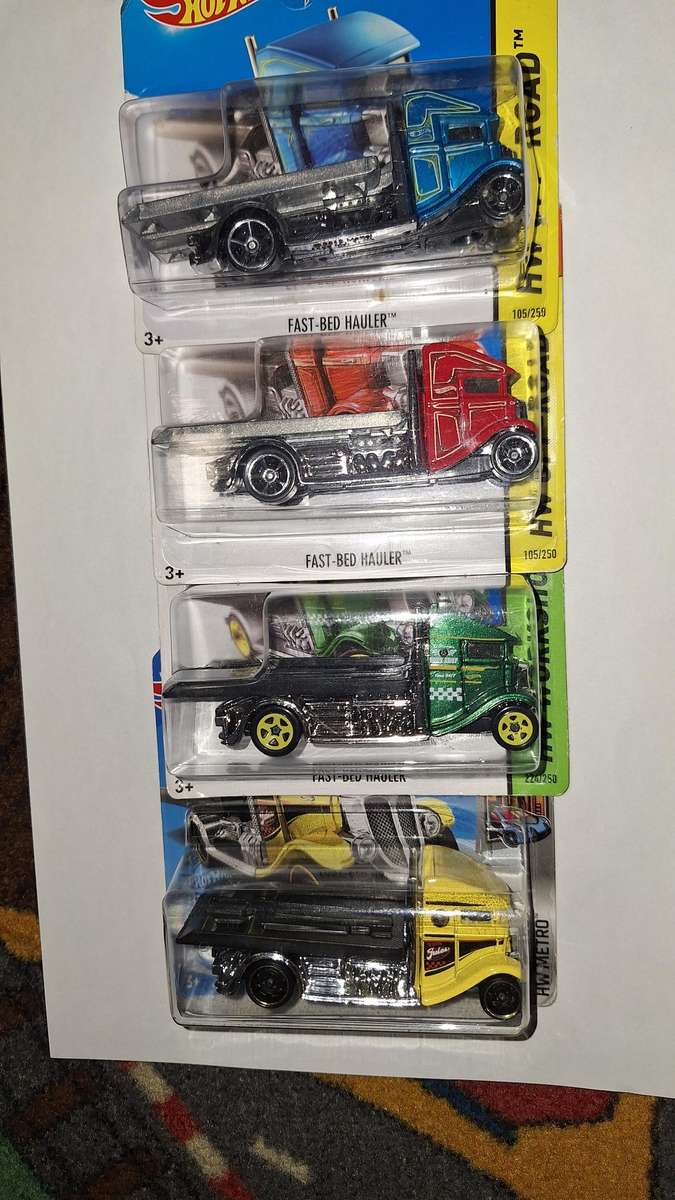 Hot Wheels - Lot of 4 - Fast Bed Hauler - Blue, Red, Green and Yellow