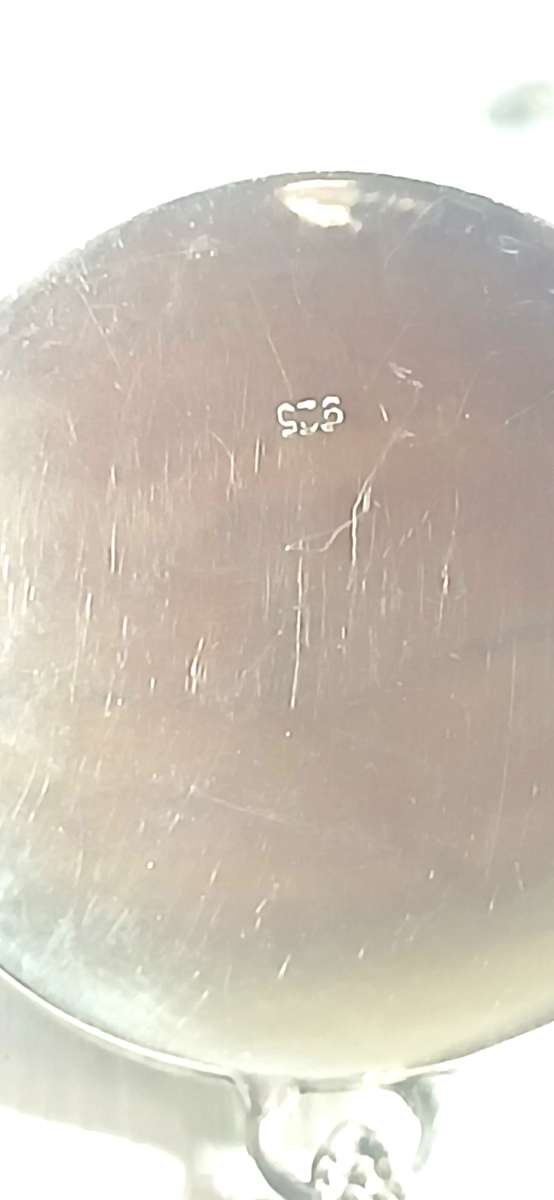 Sterling silver pendant with synthetic red stone