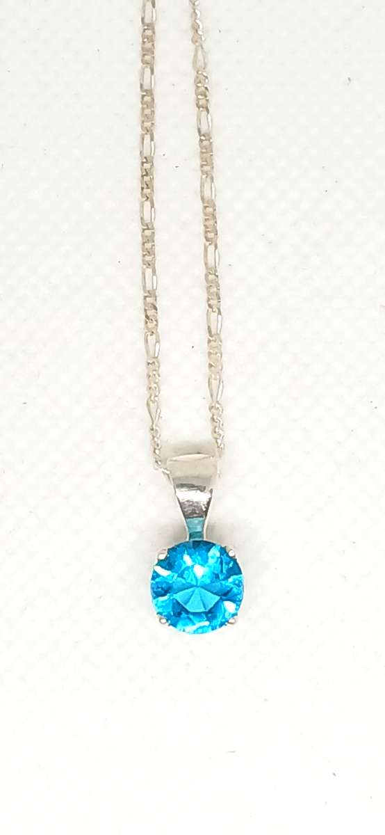 Sterling silver pendant with turquoise stone