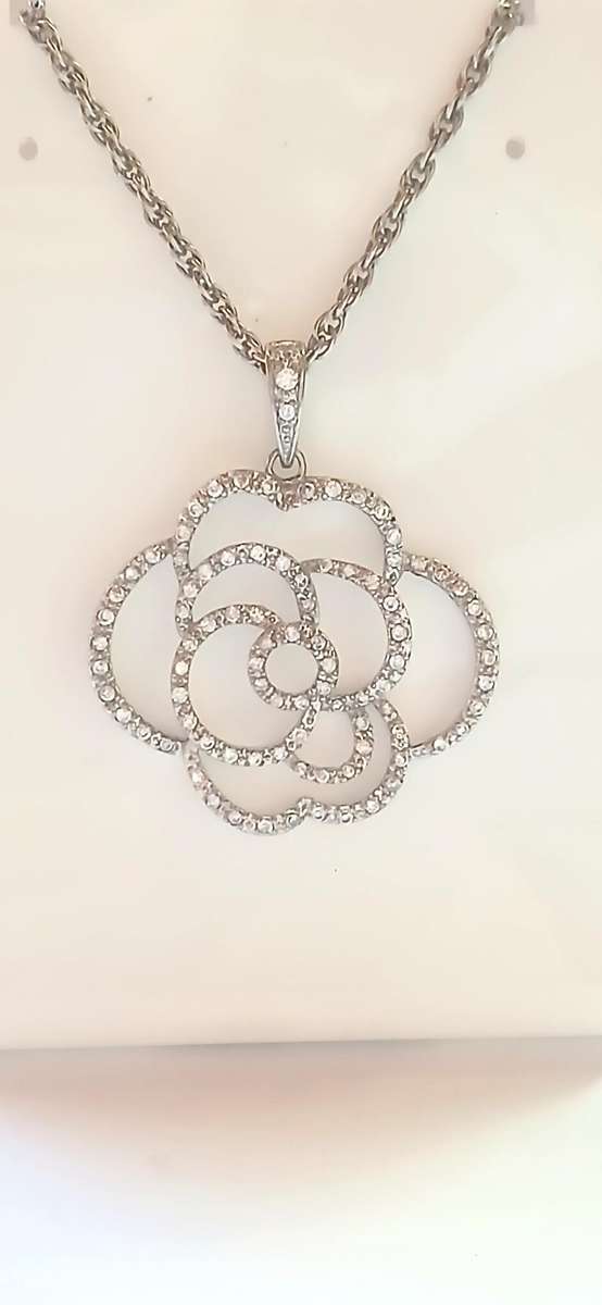 Sterling silver "rose' pendant on chain