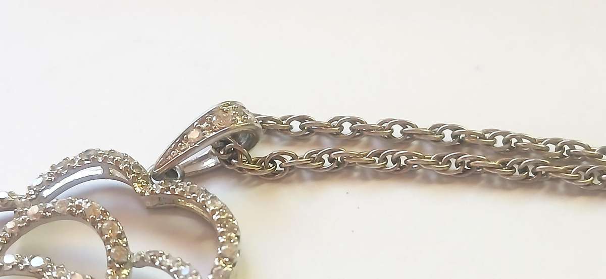 Sterling silver "rose' pendant on chain