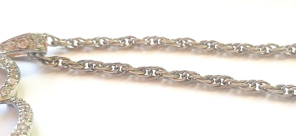 Sterling silver "rose' pendant on chain