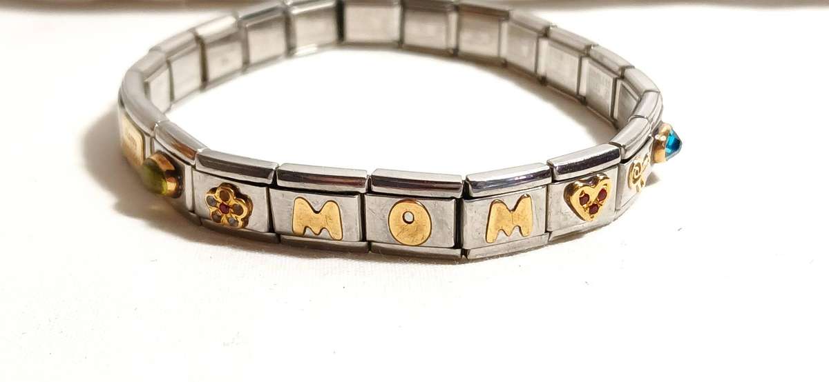 Stainless steel nomination bracelet with 9ct gold
