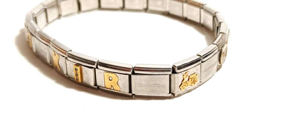 Stainless steel nomination bracelet with 9ct gold