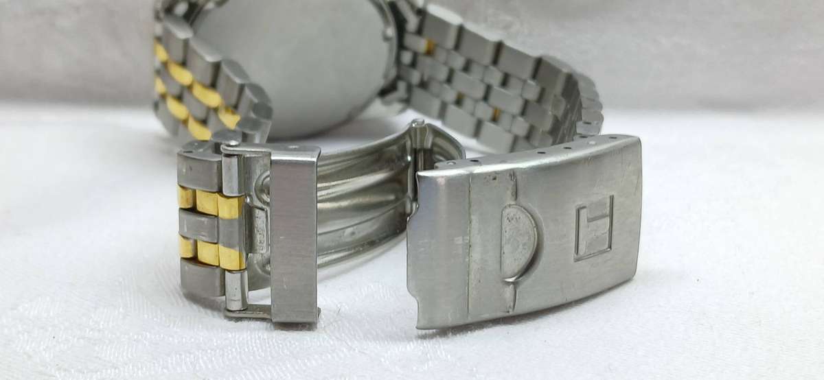 Classic Tissot PR 100 men's dress watch