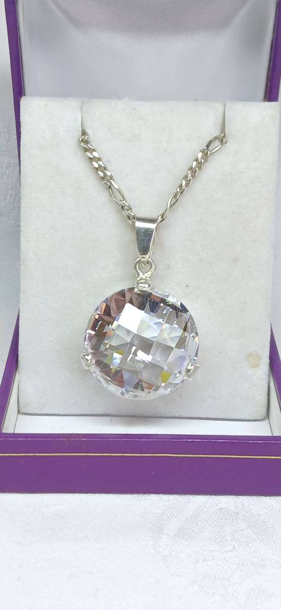 Sterling silver pendant with crystal stone on chain