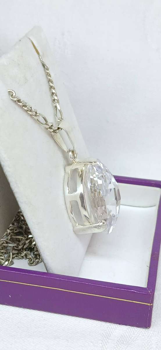 Sterling silver pendant with crystal stone on chain