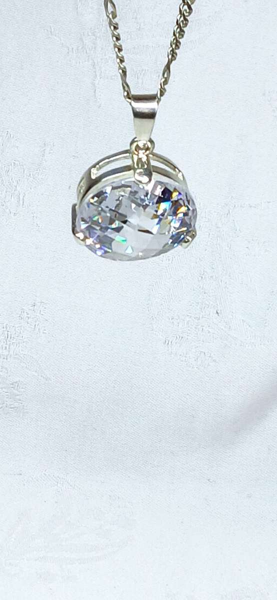Sterling silver pendant with crystal stone on chain