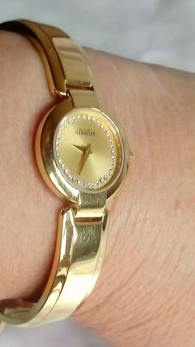 Michel Herbelin gold tone M-Band ladies watch