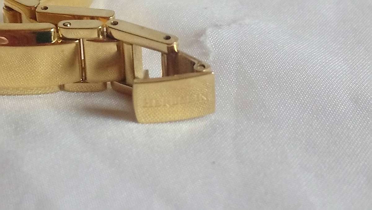 Michel Herbelin gold tone M-Band ladies watch