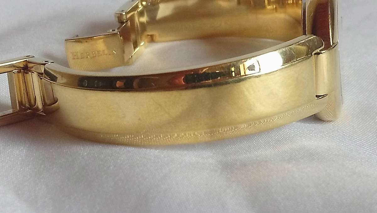 Michel Herbelin gold tone M-Band ladies watch