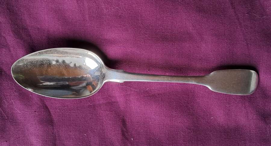 Solid silver dessert spoon by a Cape silversmith