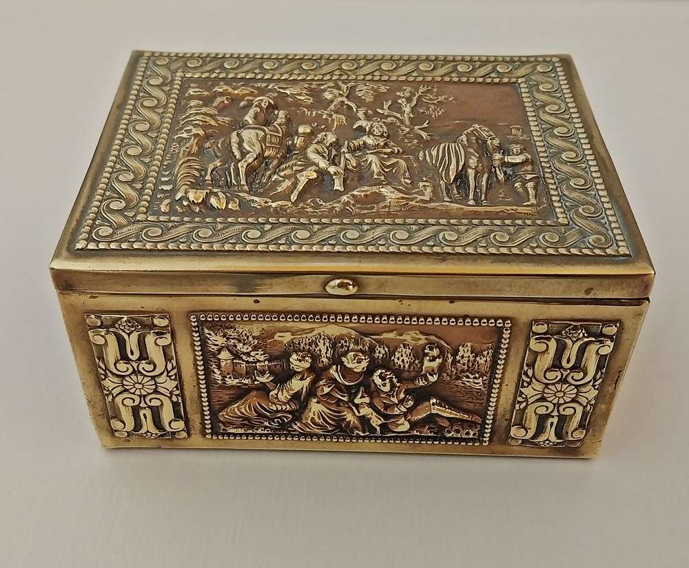 Antique brass and copper trinket box with stunning embossed designs